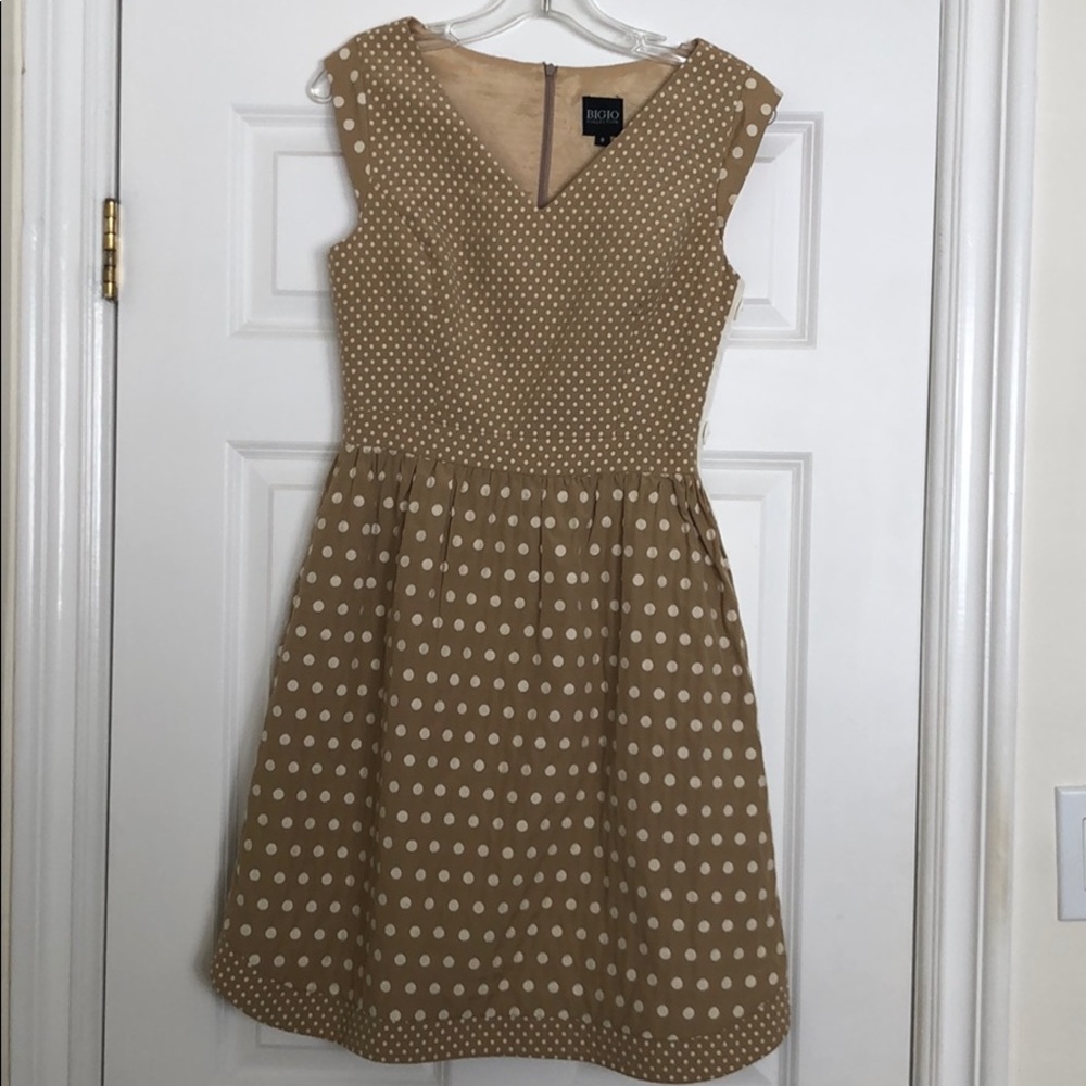 Yellow dress with embroidered polka dots